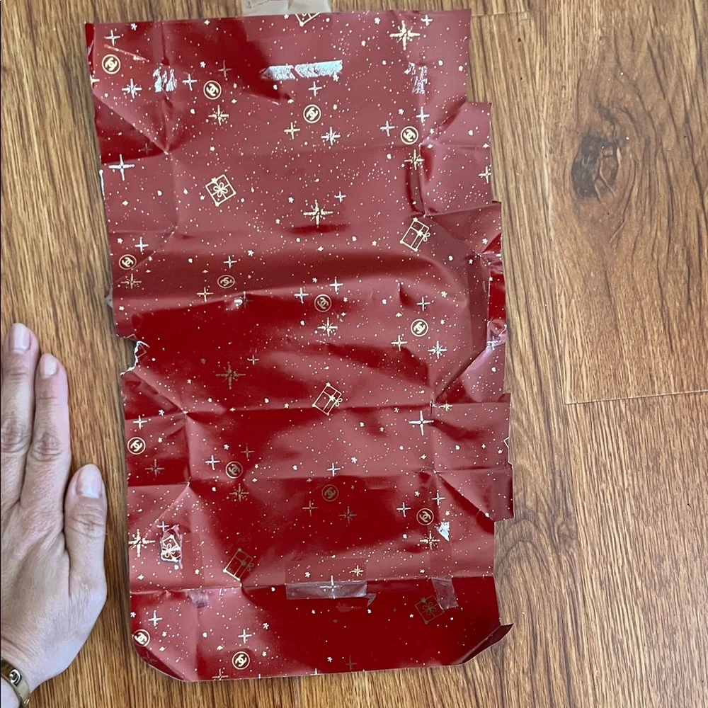 CHANEL Red Gift Wrap with Festive Patterns